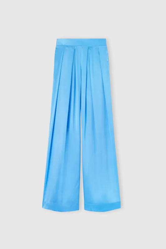Stretch silk palazzo trousers with satin waistband sold by Ermanno Scervino