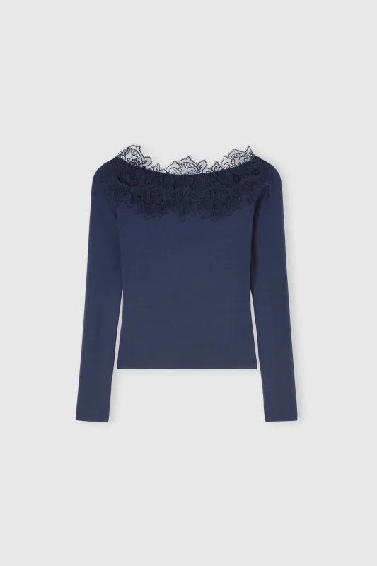 Crêpe jersey top with macramé lace and cut-out tulle inserts sold by Ermanno Scervino