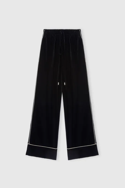 Palazzo pants in velvet with contrast piping sold by Ermanno Scervino