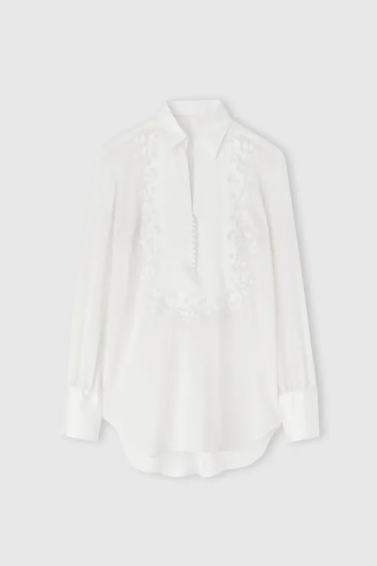 Silk blouse with hand-carved embroidery sold by Ermanno Scervino