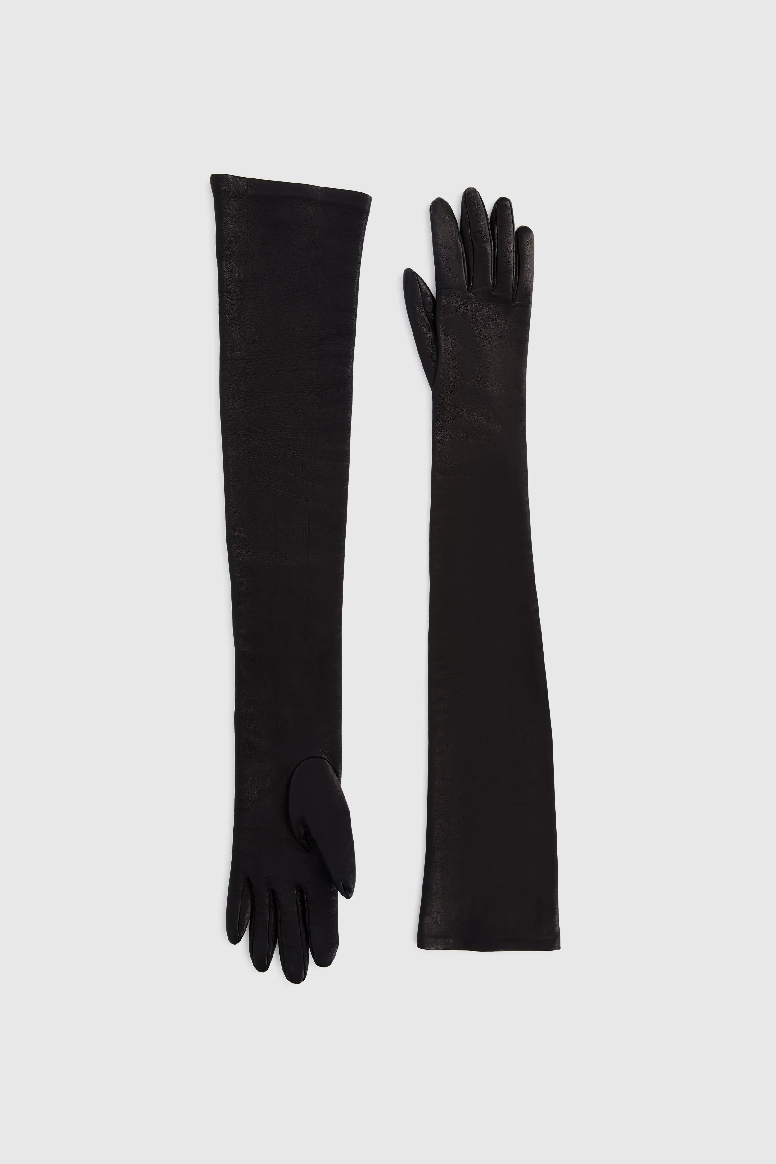 Long glove in black nappa leather sold by Ermanno Scervino