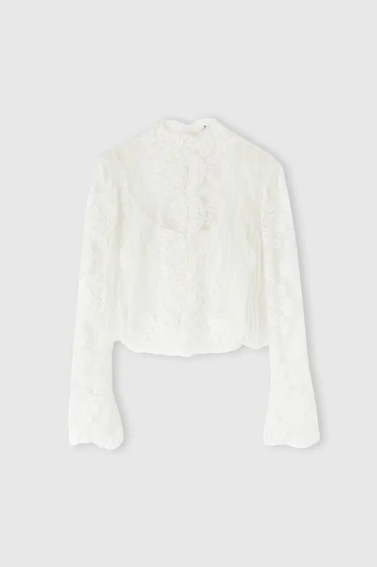 Pure silk blouse with lace embroidery sold by Ermanno Scervino