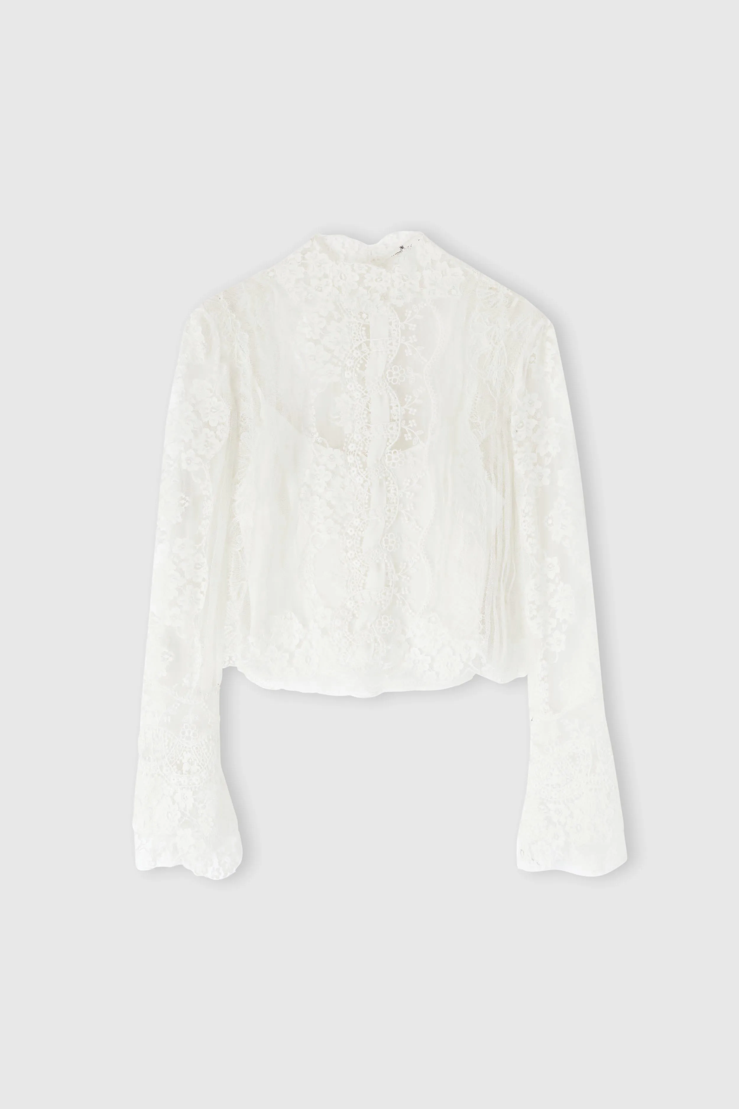 Pure silk blouse with lace embroidery sold by Ermanno Scervino