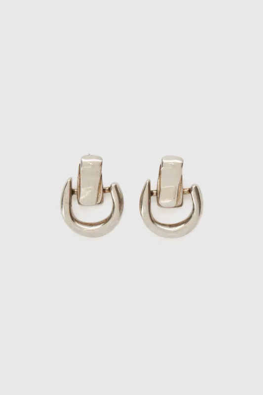 Small platinum half-hoop earrings sold by Ermanno Scervino
