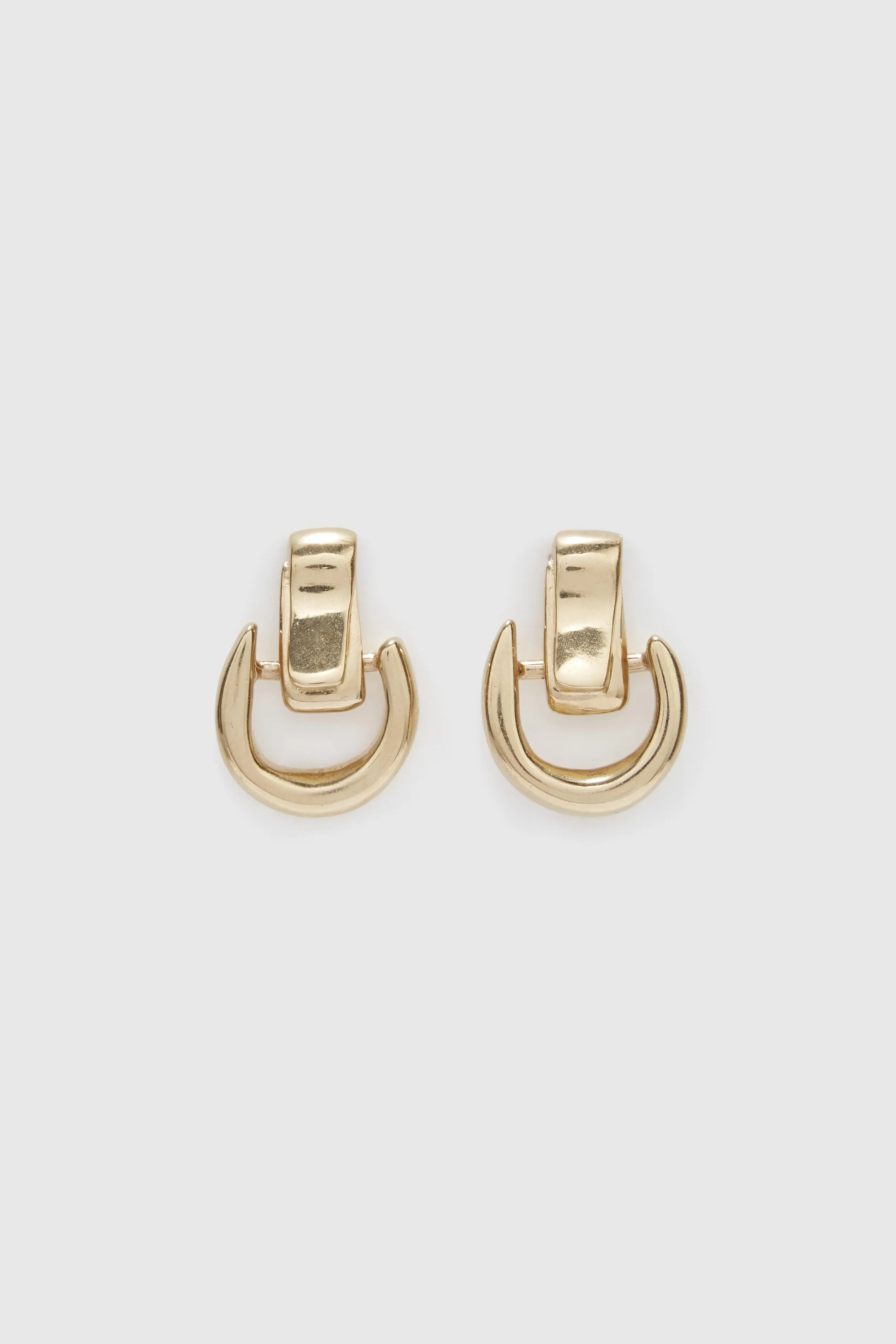 Small gold half-hoop earrings sold by Ermanno Scervino