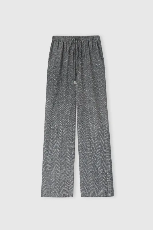 Palazzo trousers with herringbone design and hand-applied crystals made by Ermanno Scervino
