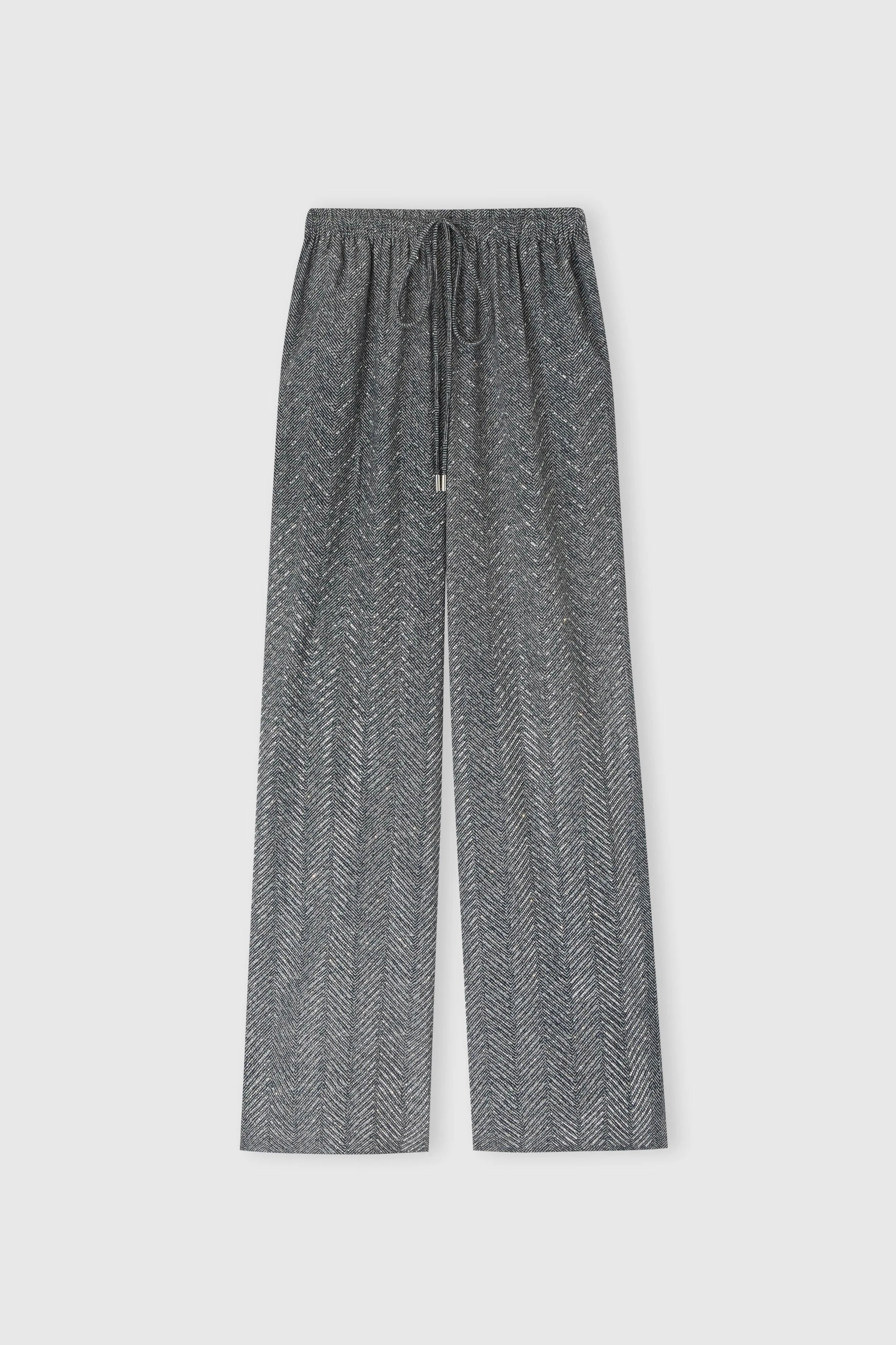 Palazzo trousers with herringbone design and hand-applied crystals sold by Ermanno Scervino