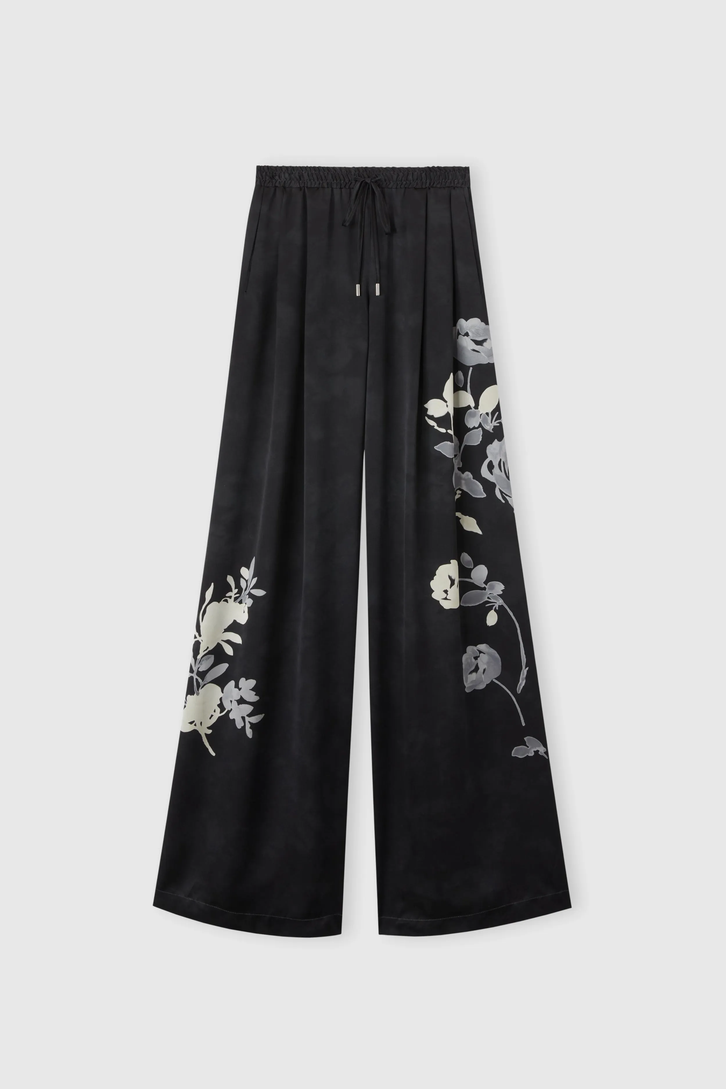Pure silk trousers with floral print sold by Ermanno Scervino