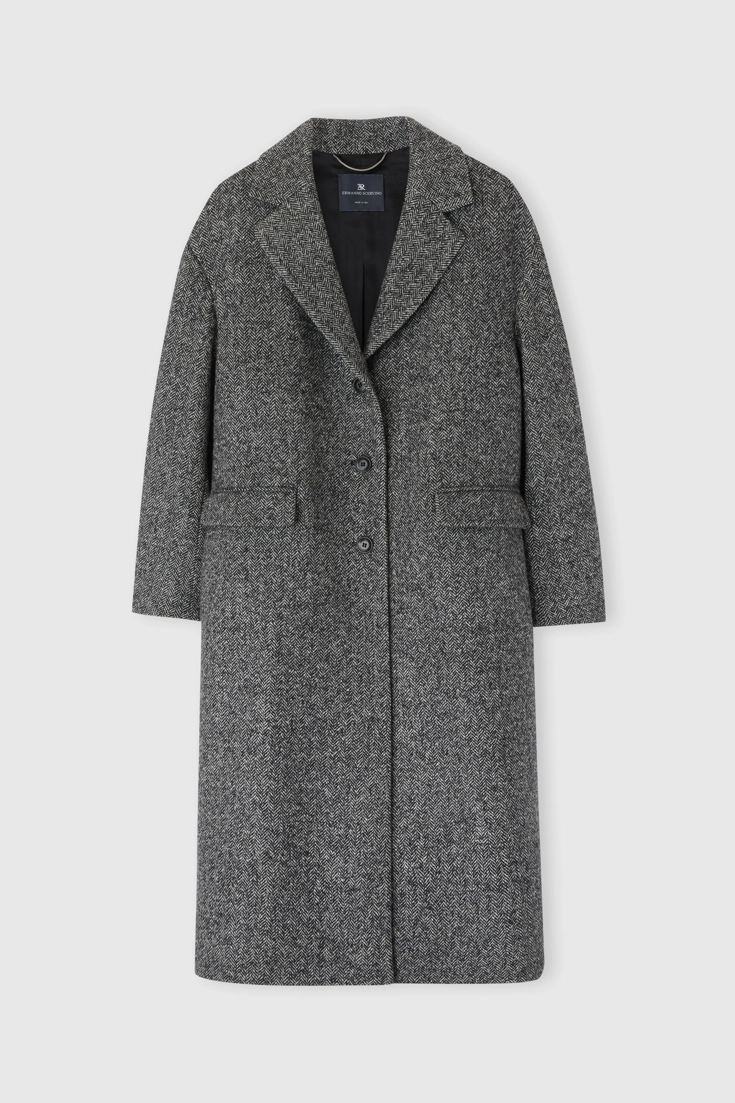 Single-breasted tailored coat with a masculine fit and belt at the waist sold by Ermanno Scervino