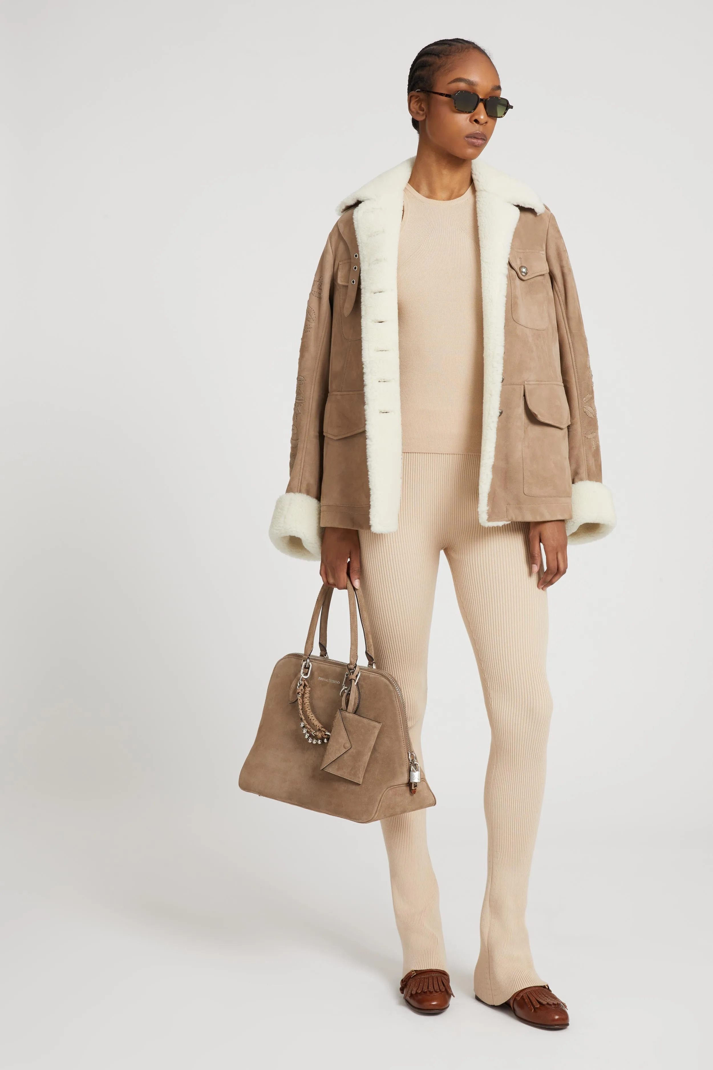 Nude viscose blend leggings with vertical rib pattern sold by Ermanno Scervino product image thumbnail 2