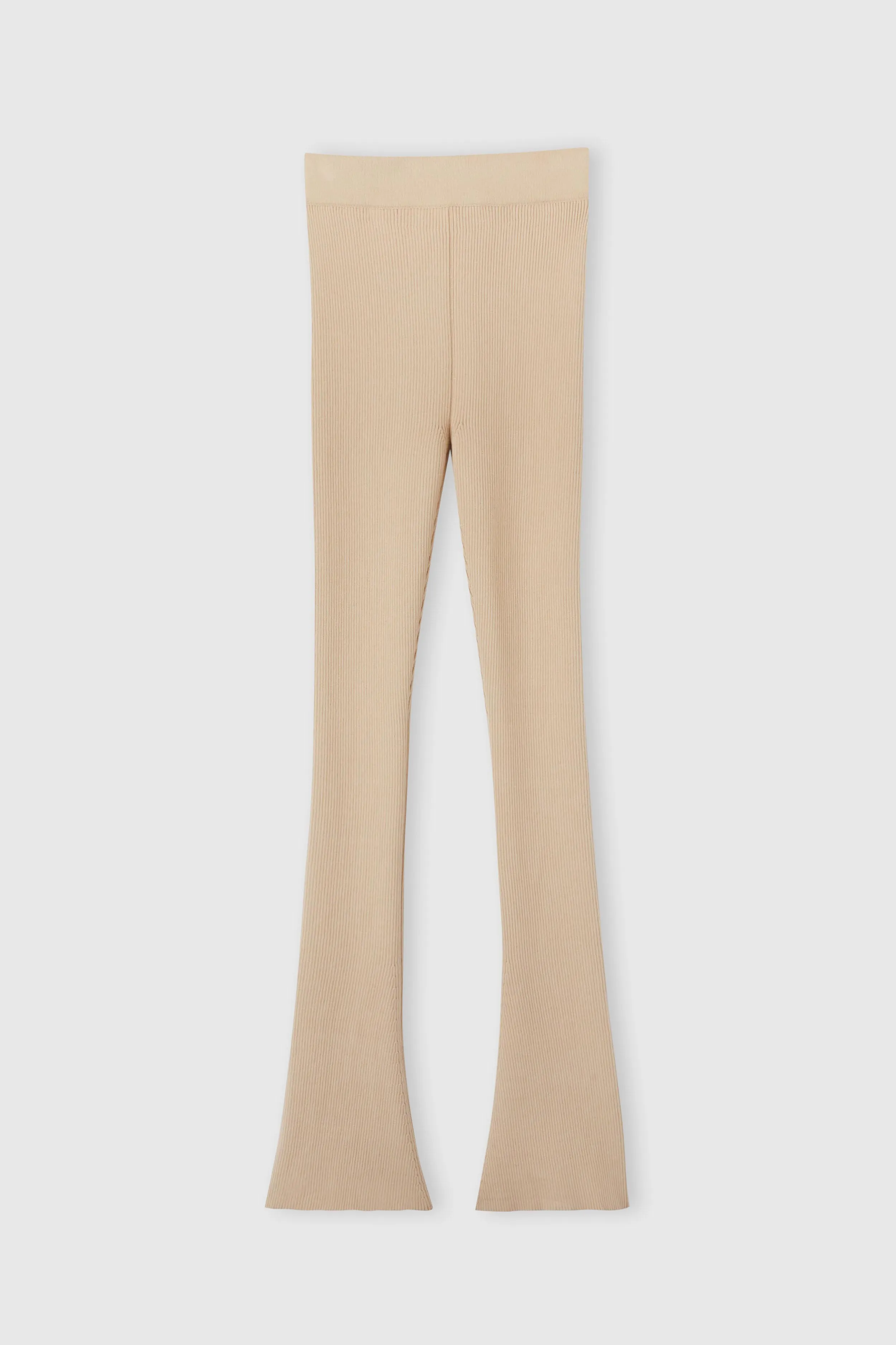 Nude viscose blend leggings with vertical rib pattern sold by Ermanno Scervino