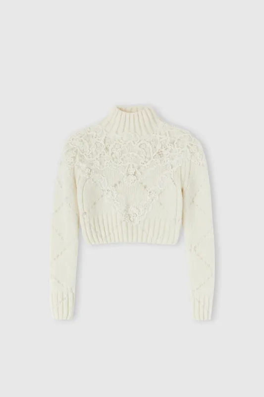 Cropped sweater in alpaca and merino wool blend with diamond pattern and rebrodè lace application sold by Ermanno Scervino