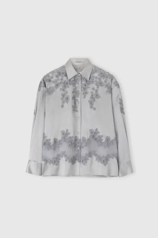 Silk shirt with rebrodè lace sold by Ermanno Scervino