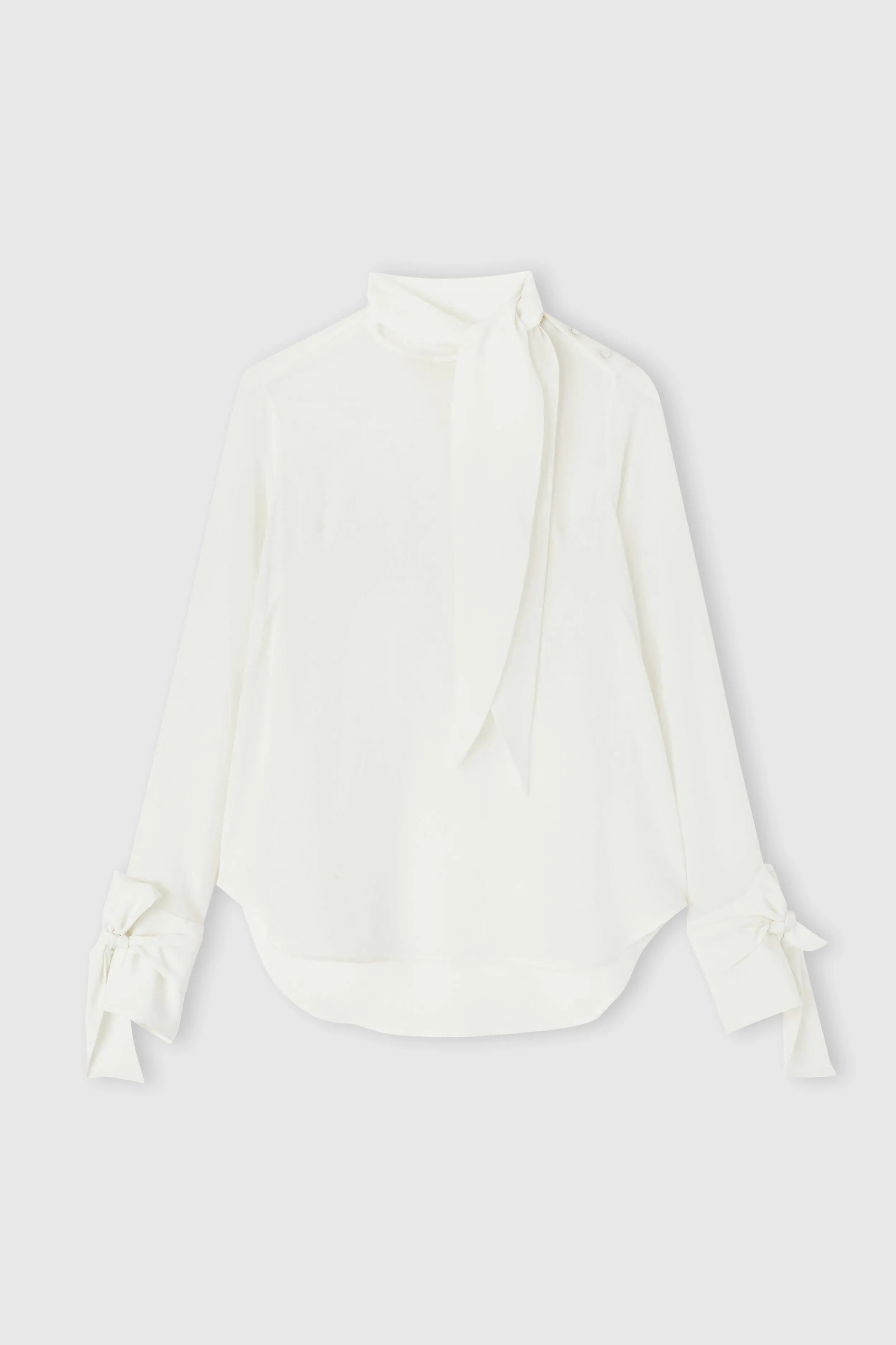 Pure silk blouse with decorative bows sold by Ermanno Scervino