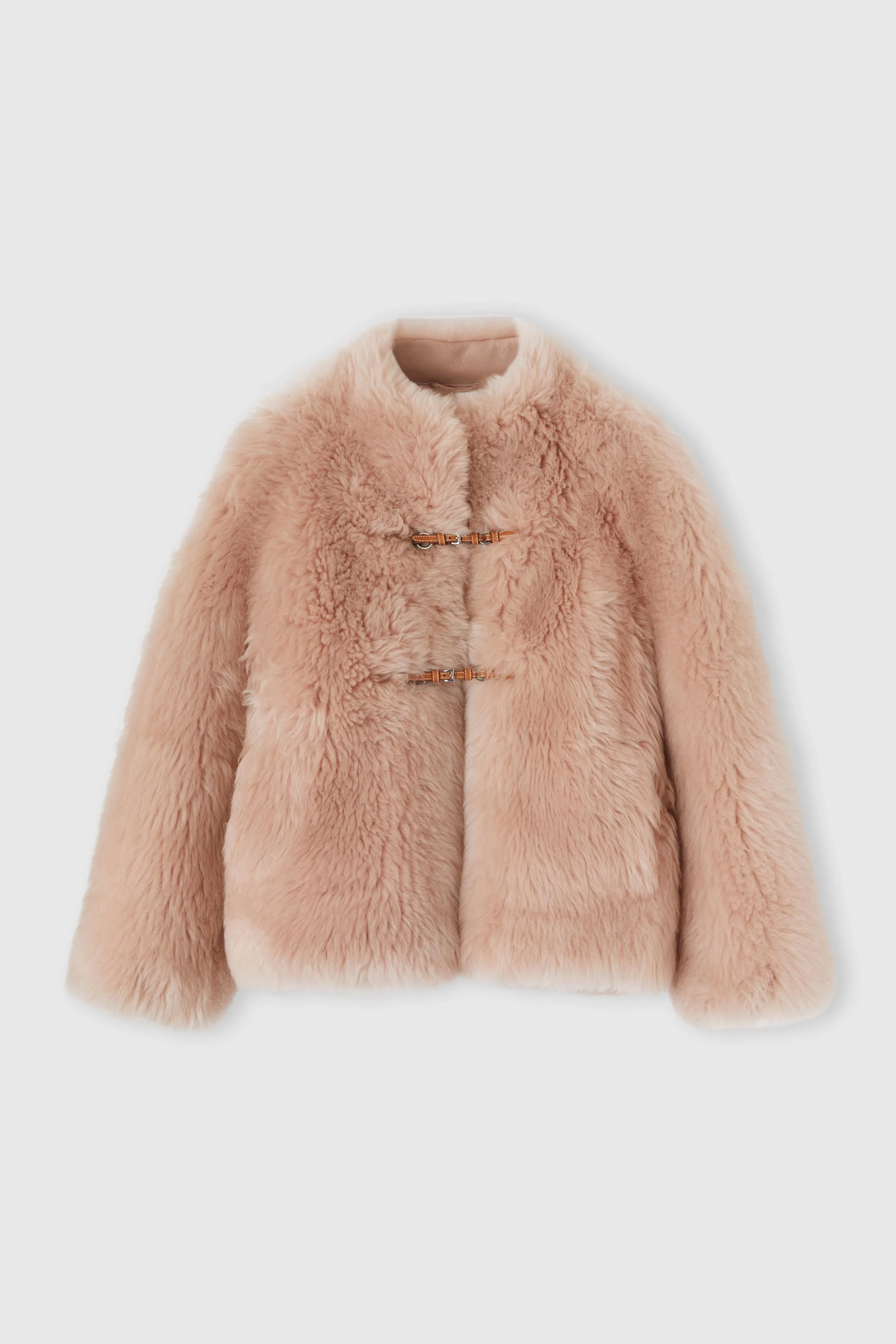 Lambskin leather over jacket with leather and gold metal details. sold by Ermanno Scervino