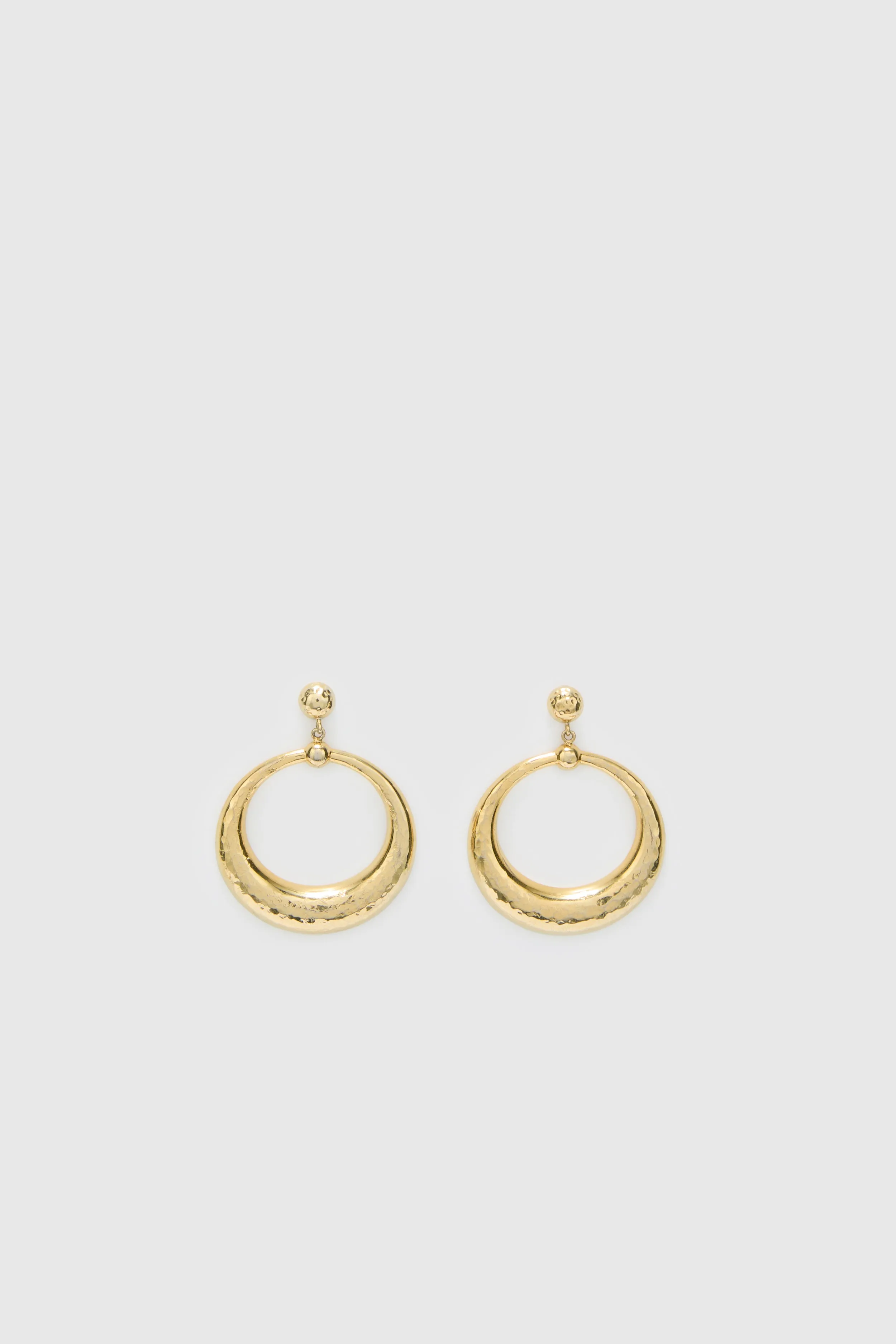 Gold circle earrings sold by Ermanno Scervino
