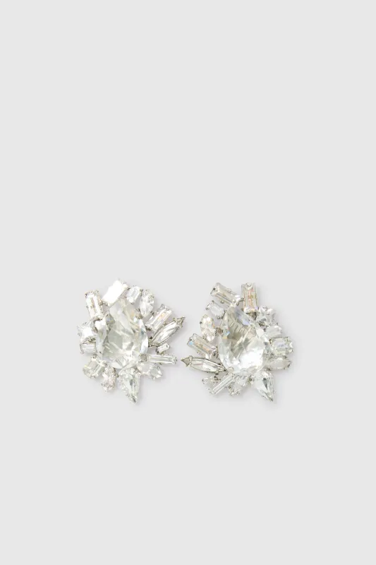 Clip-on daisy earrings sold by Ermanno Scervino