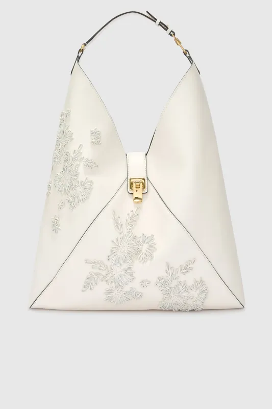 Large hobo bag in calf leather with floral embroidery made by Ermanno Scervino