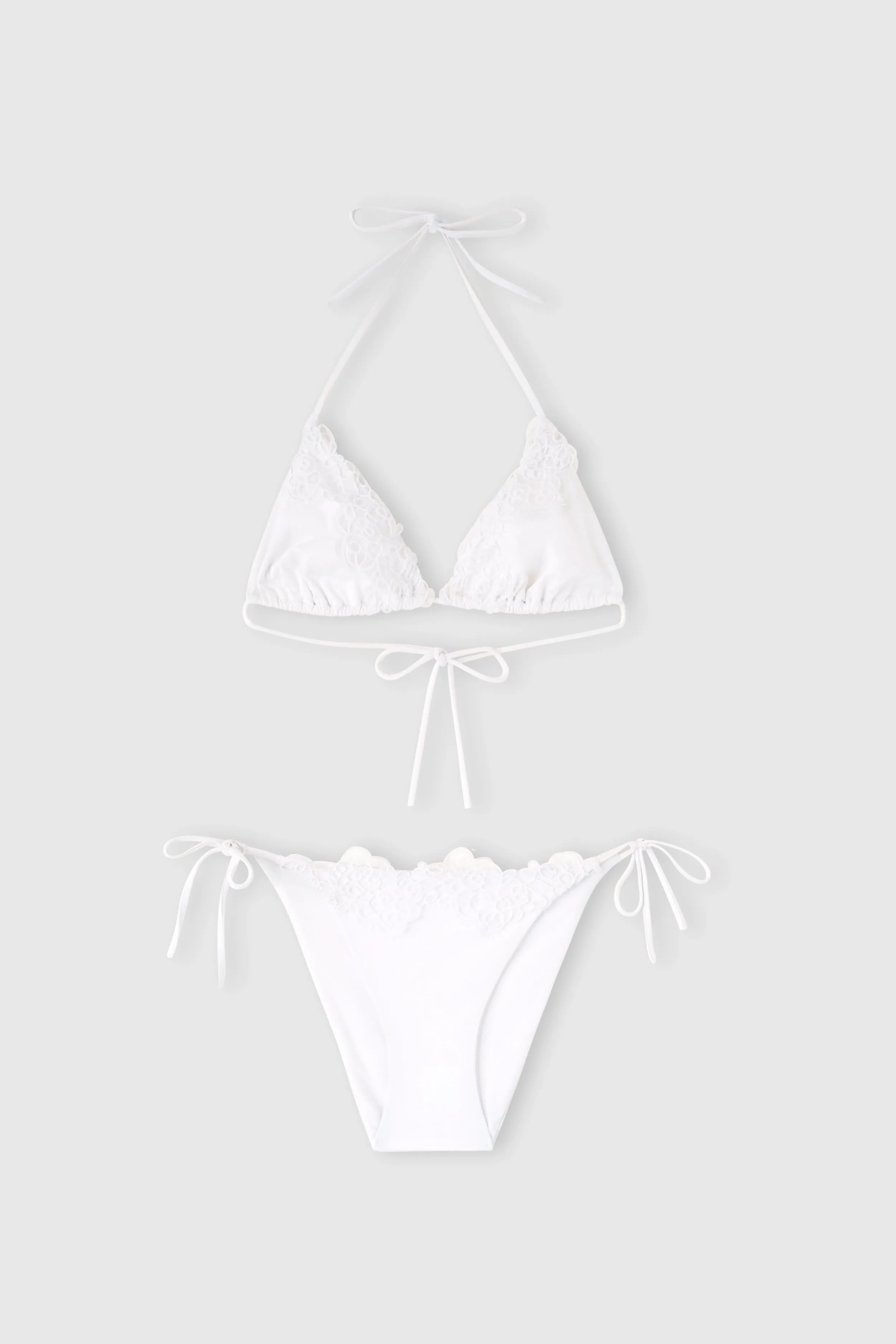 Triangle bikini with macramé lace sold by Ermanno Scervino