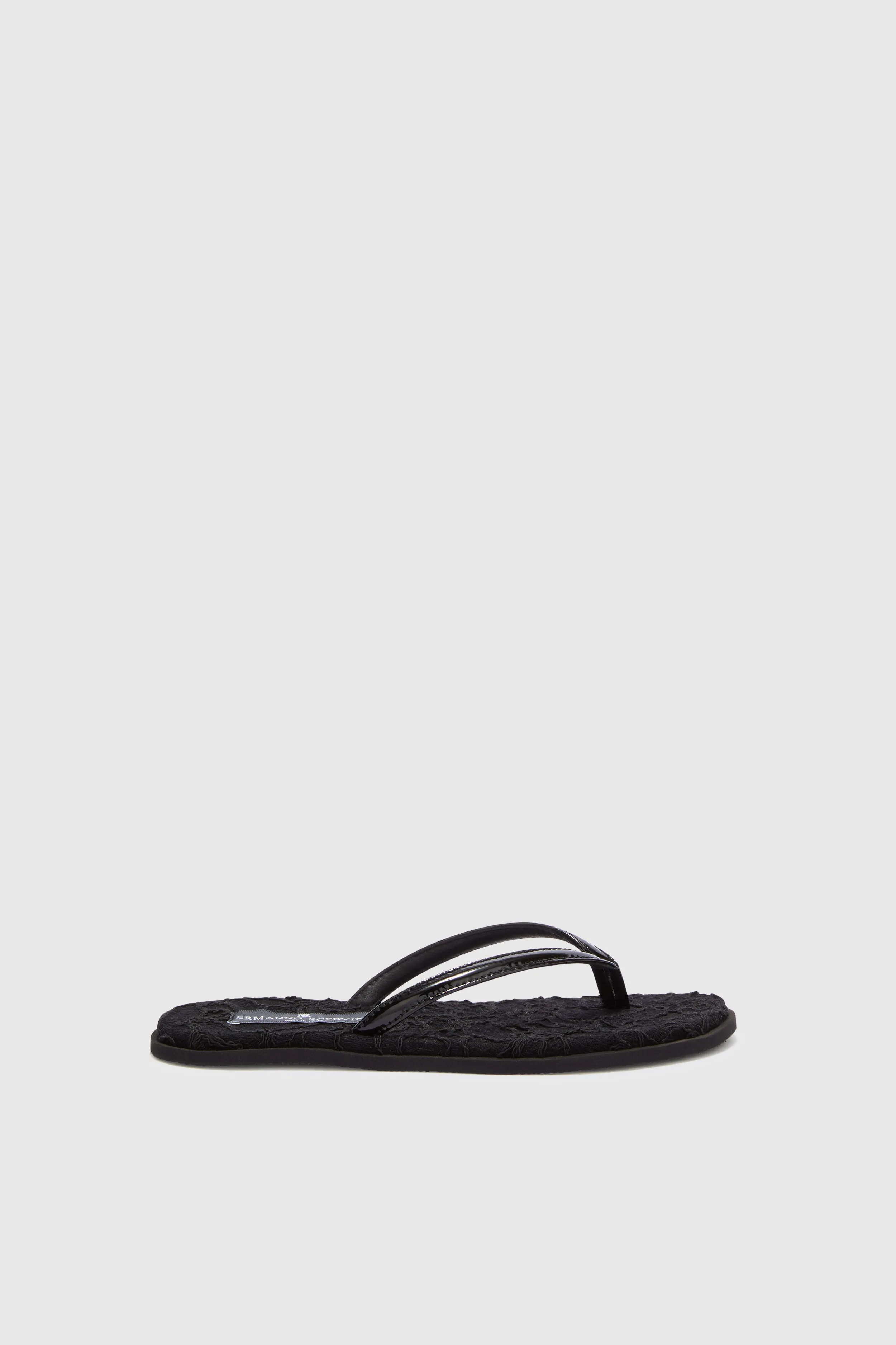 Black lace flip flop sold by Ermanno Scervino