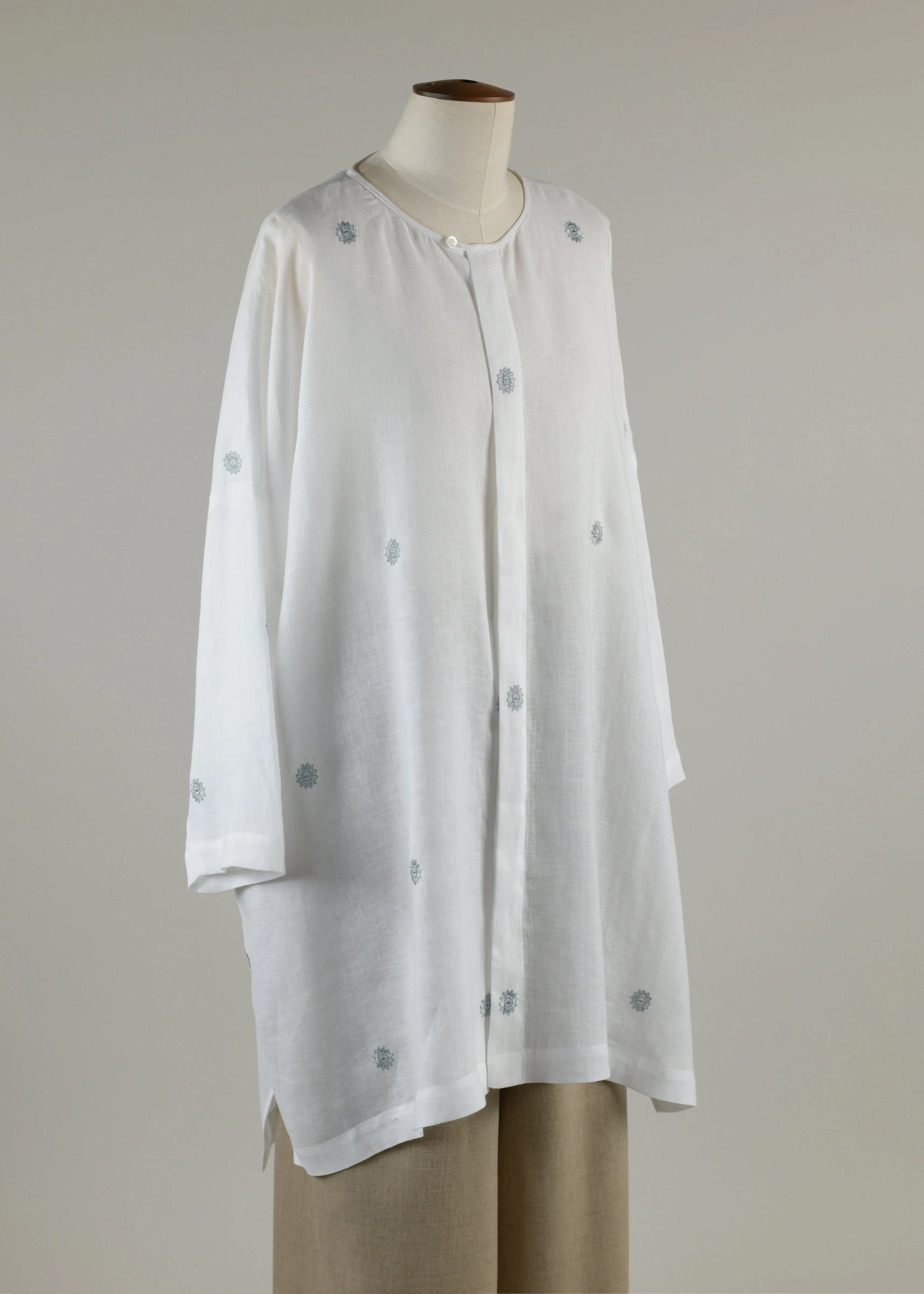 linen wide longer back bound neck shirt very long with slits sold by eskandar