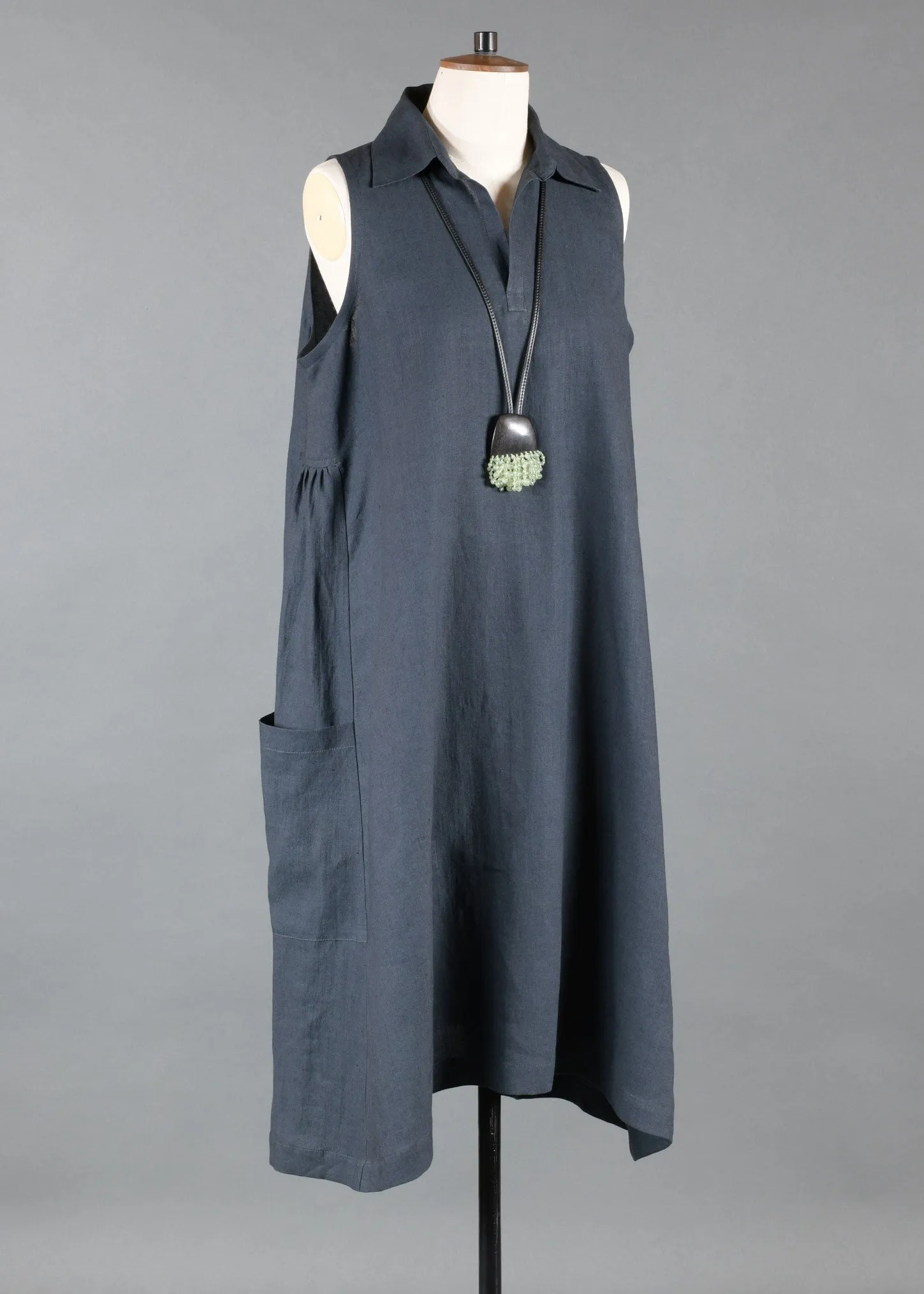 linen 3/4 side pleat sleeveless dress with collar & front pocket opening sold by eskandar