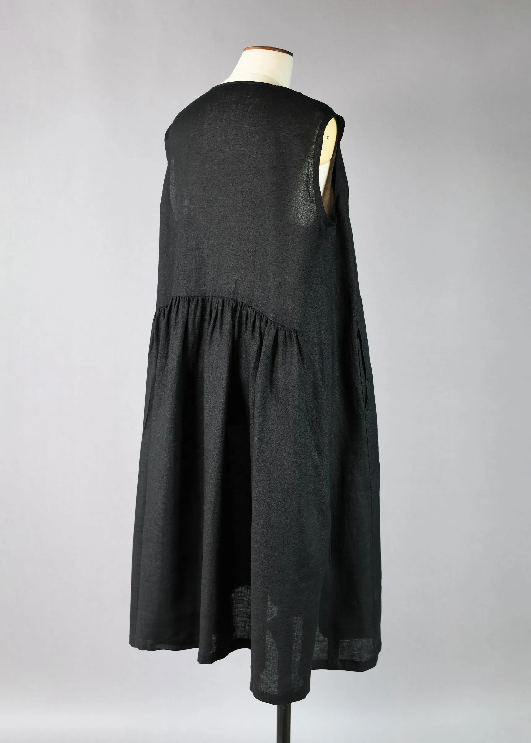 linen sleeveless bound neck shirt dress with full pleated panels sold by eskandar product image thumbnail 2