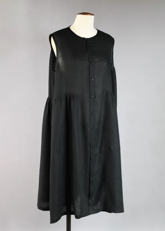 linen sleeveless bound neck shirt dress with full pleated panels sold by eskandar