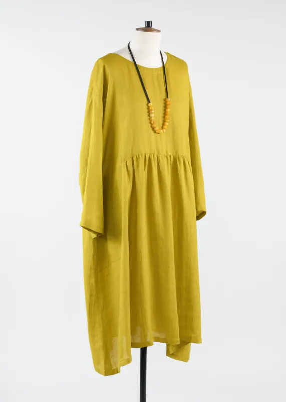 handkerchief linen a-line round neck dress with pleated panels sold by eskandar