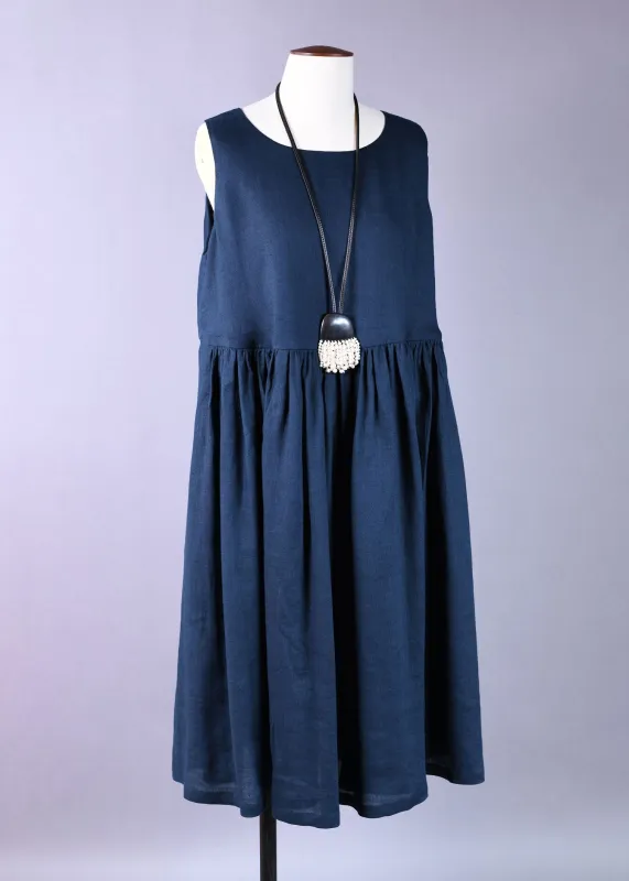 linen sleeveless round neck dress with full pleated skirt sold by eskandar