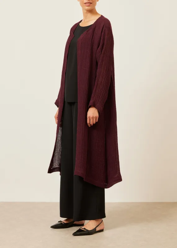 linen guaze 3/4 length side pleated round neck coat sold by eskandar