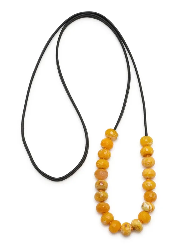 single strand necklace of semi-precious gemstones sold by eskandar