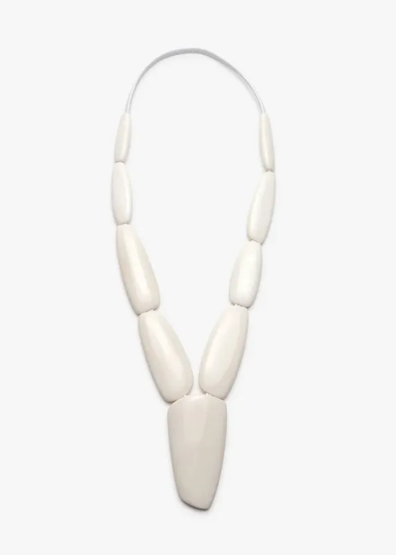 mid length segmented white bone necklace sold by eskandar