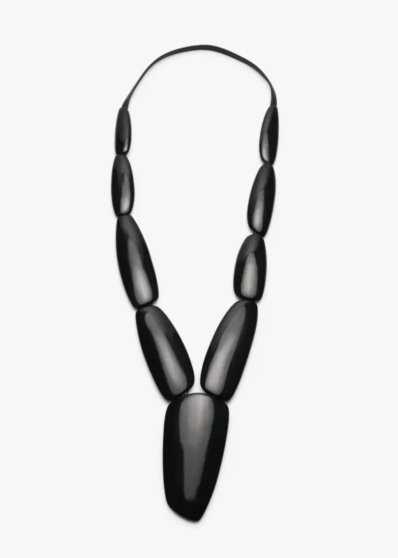 mid length segmented black horn necklace sold by eskandar