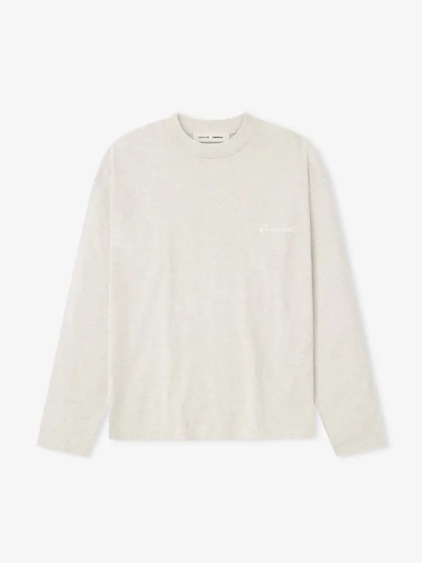 Embroidered Classic Long Sleeve Tee sold by Essentials