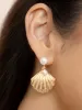 Scallop Shell and Pearl Earrings sold by ettika