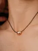 Polished Pebble Leather Pendant Necklace sold by ettika