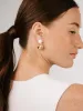 Large Pebble and Pearl Dangle Earrings sold by ettika