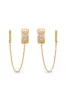 Double Piercing Bezel Crystal Dangle Earrings sold by ettika