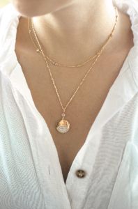 Crystal Dipped Layered Pendant Necklace Set sold by ettika