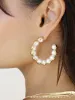 Pearl Inlay and Gold Hoop Earrings sold by ettika