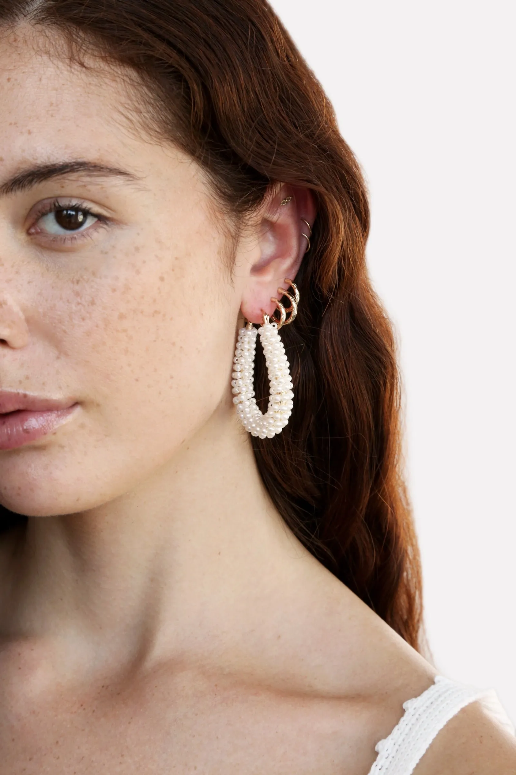 Pearl Wrapped Hoop Earrings sold by ettika product image thumbnail 5