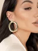 Open Circle Earrings sold by ettika