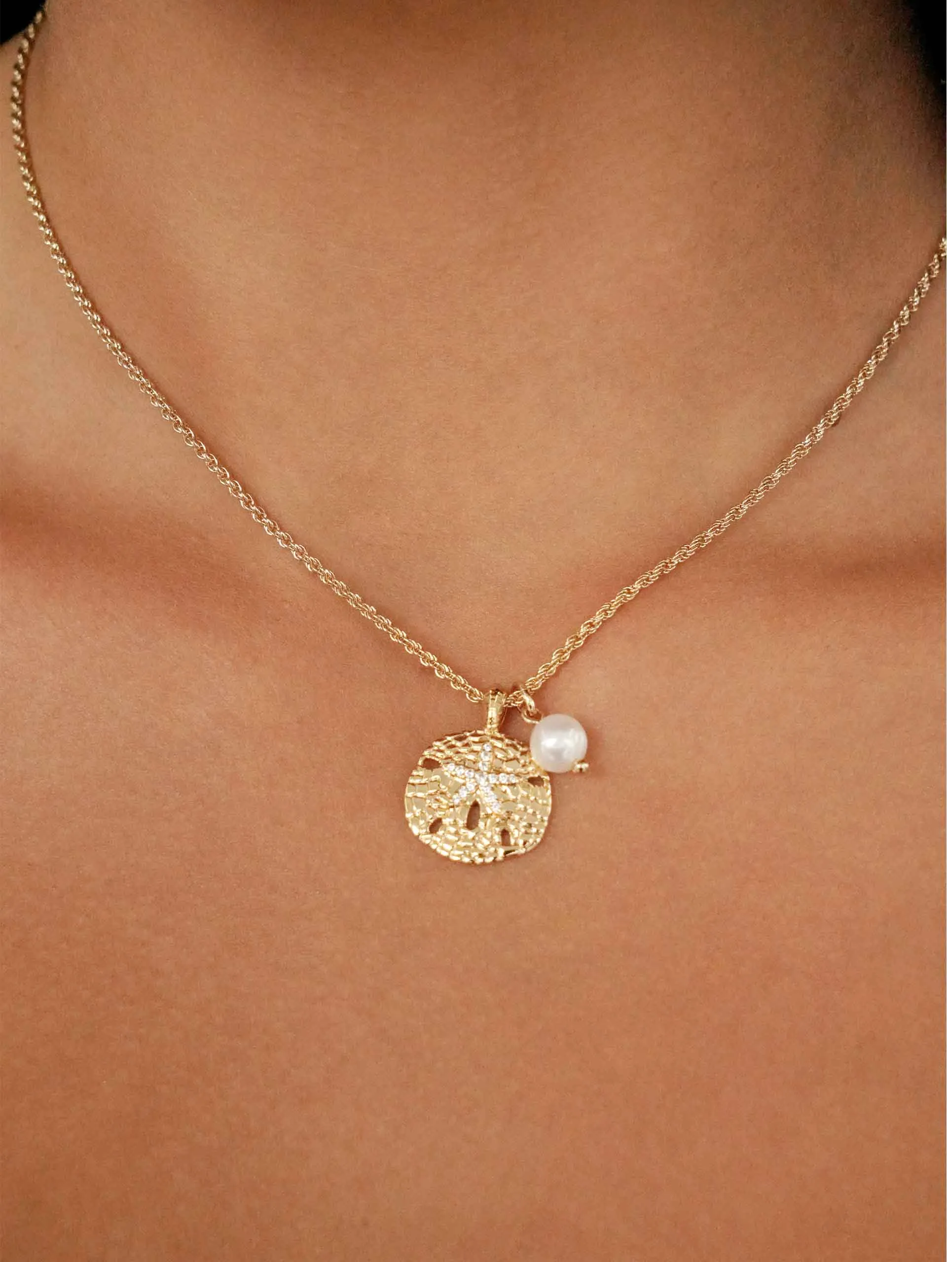 Sand Dollar Charm Necklace sold by ettika product image thumbnail 2