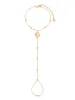 Santorini Shell Hand Chain sold by ettika