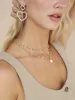 Loving Pearl Heart Earrings sold by ettika
