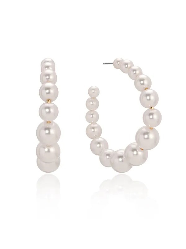 Pearl Bubble Hoops sold by ettika
