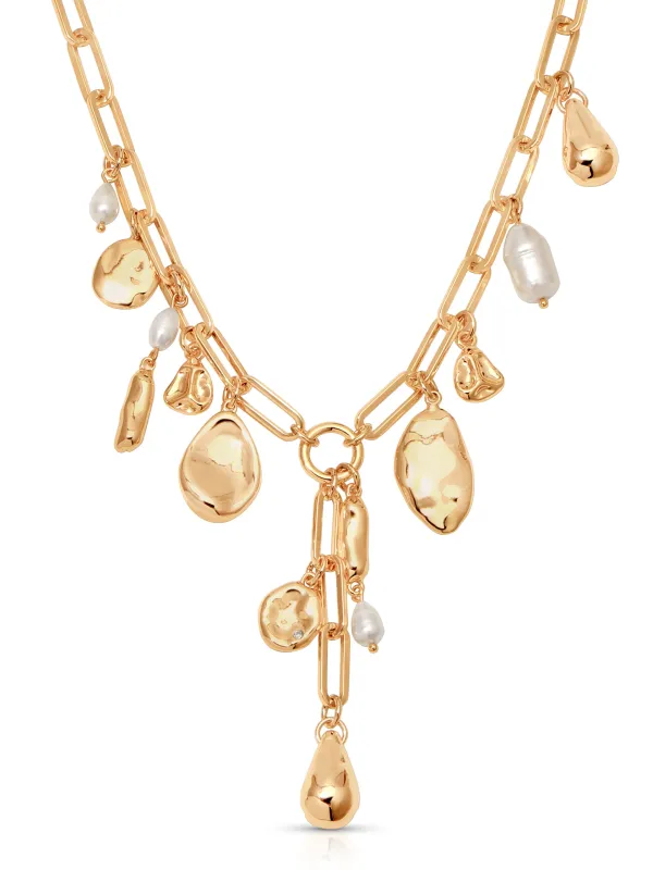 Melting Metal Charm Lariat sold by ettika