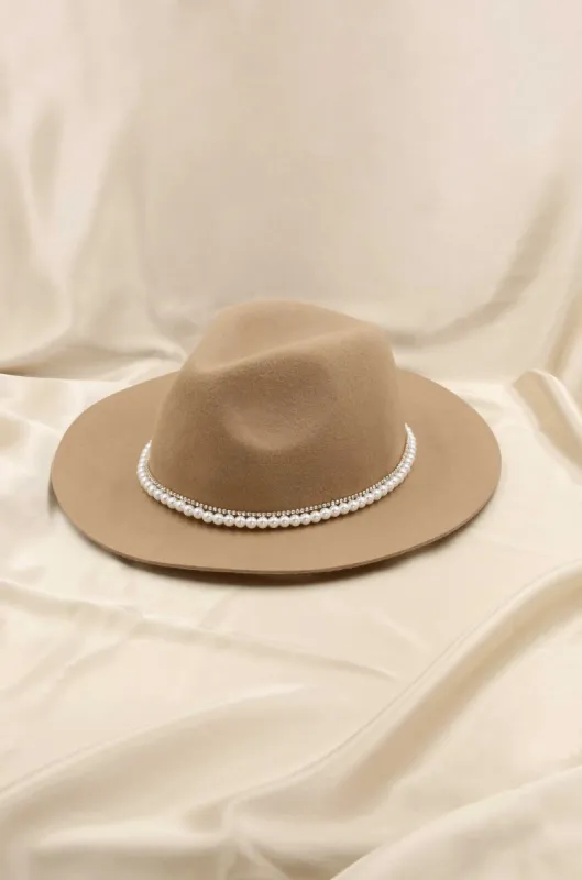 With the Band Hat in Tan with Pearls sold by ettika