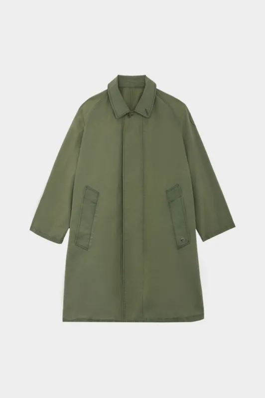 DISTANCE WAXED COTTON GREEN sold by Etudes Studio